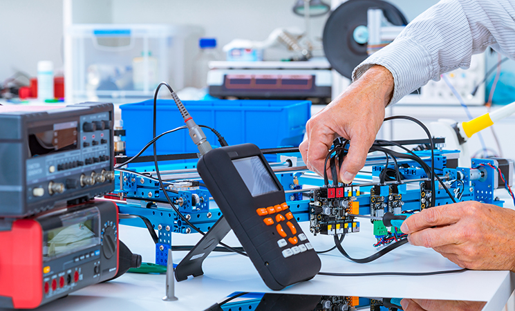 Man tinkering with wires